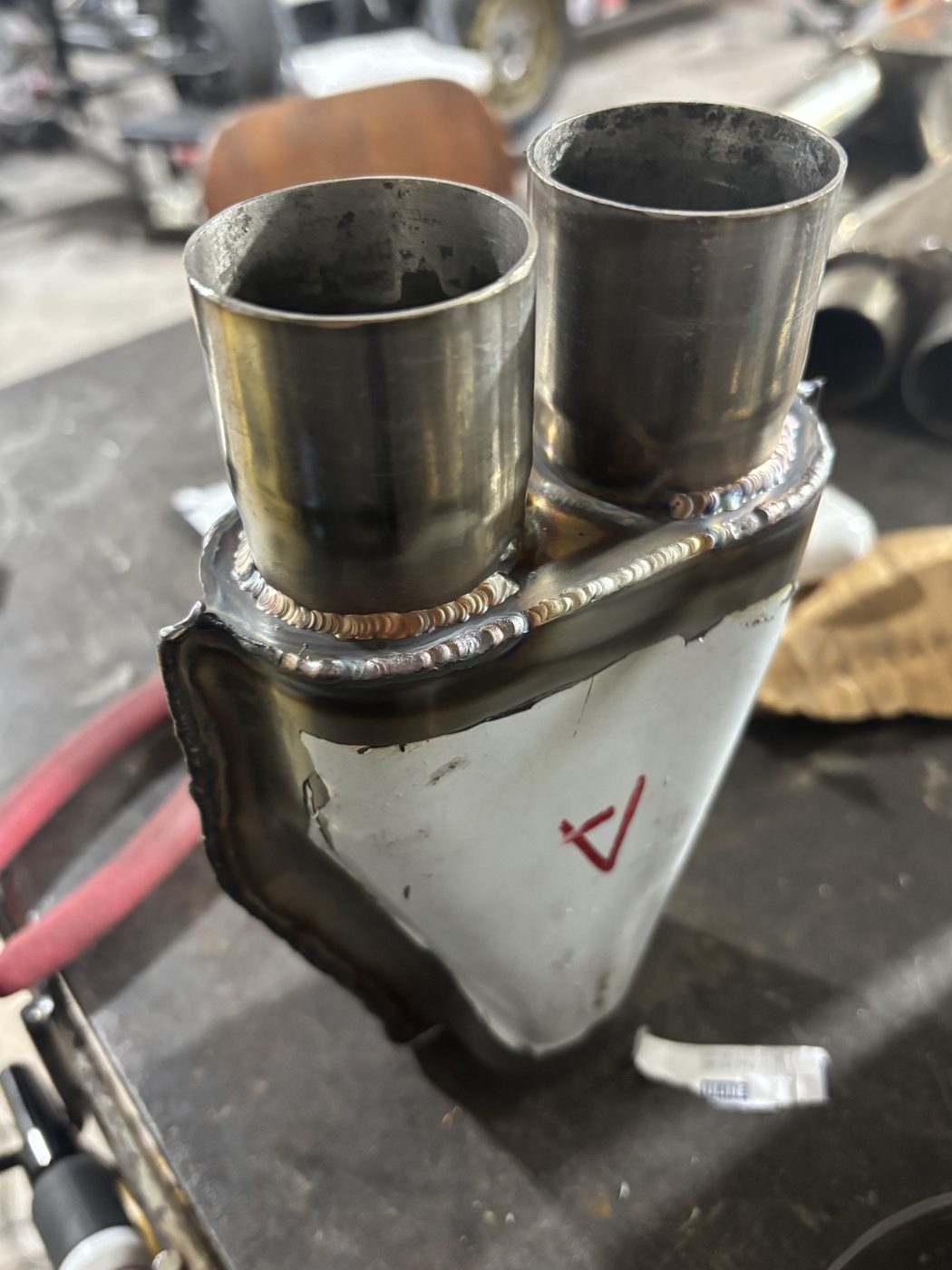 Stainless collector outlet with two tubes TIG welded in